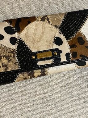 bebe Patchwork Animal-Print Clutch in Black, Brown, Cream